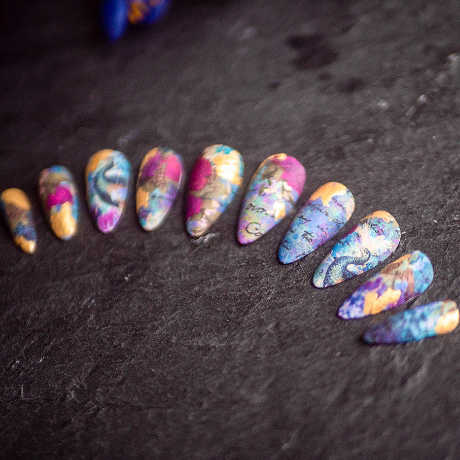 Waterslide nail decals featuring intricate, easy-to-apply designs for a flawless manicure